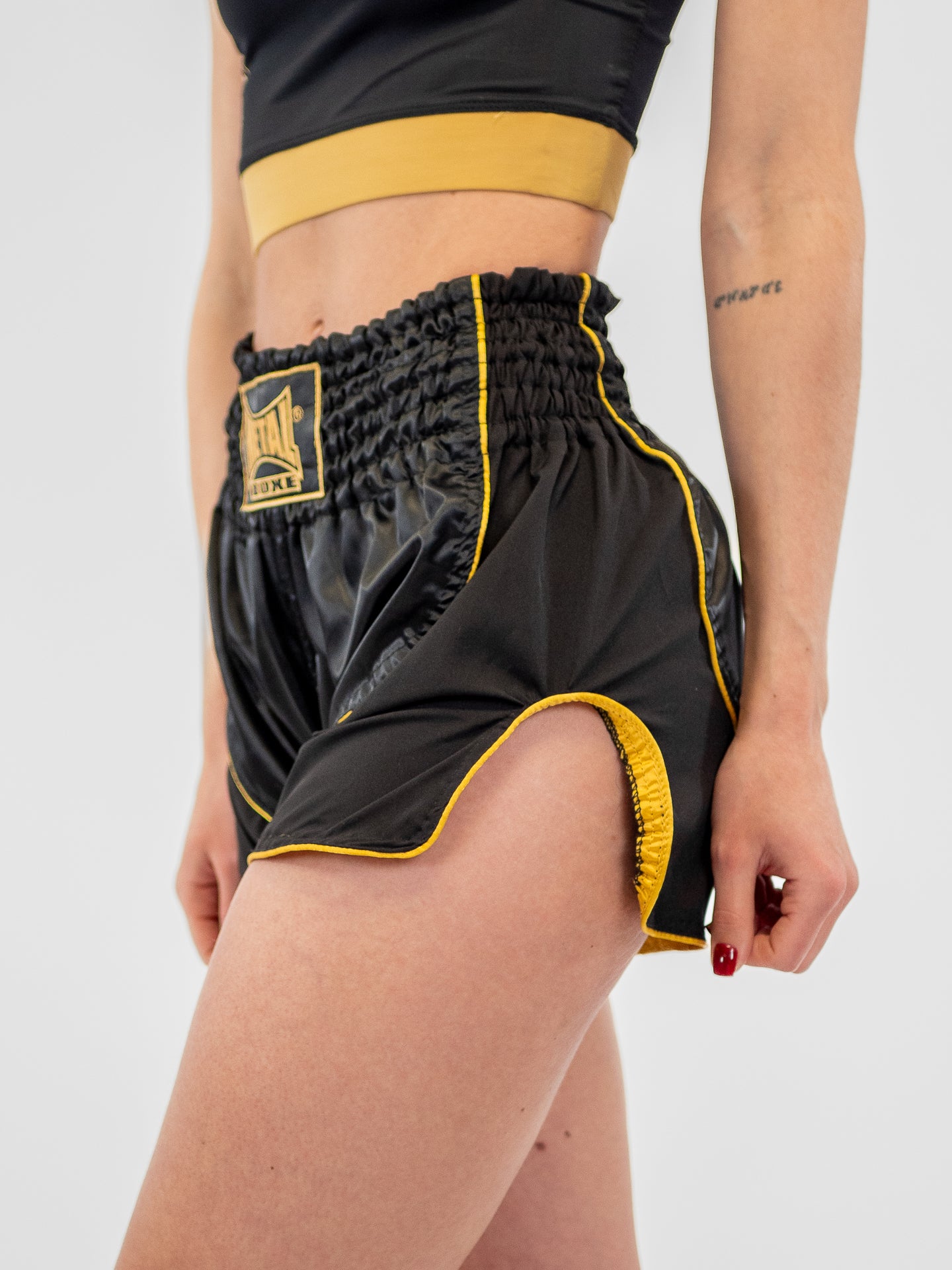 SHORT KICK SIAM BLACK GOLD WOMEN