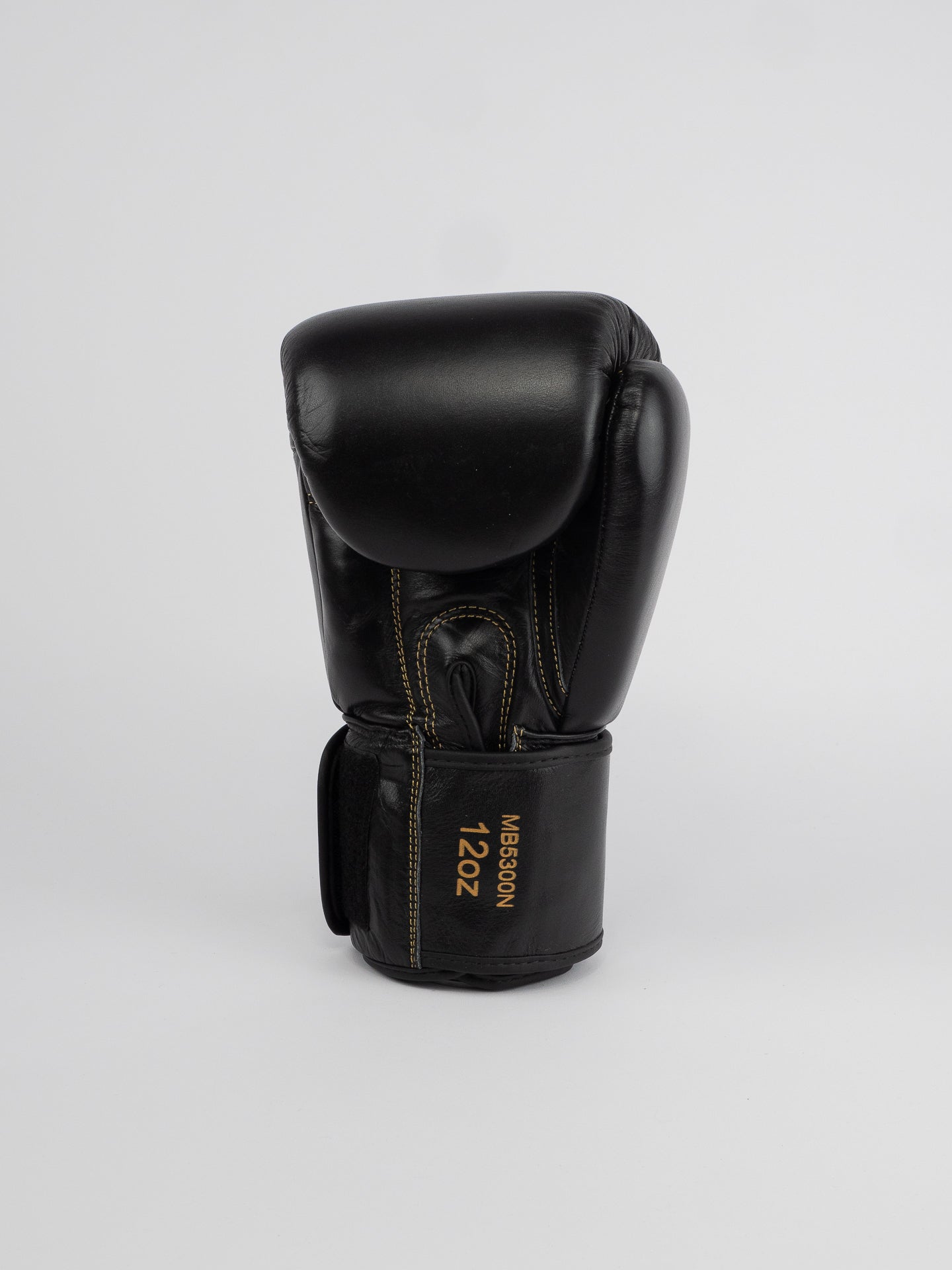 THAI SERIES BLACK GOLD LEATHER BOXING GLOVES