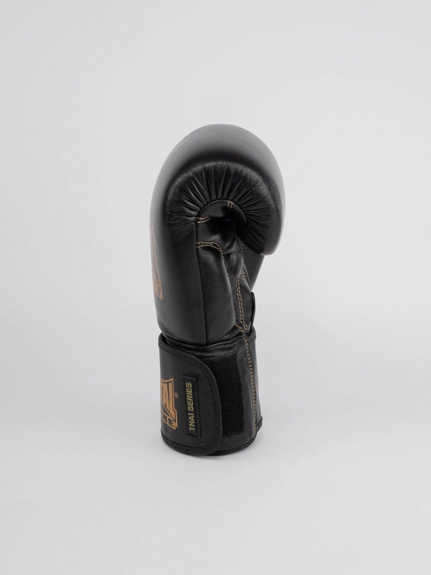 THAI SERIES BLACK GOLD LEATHER BOXING GLOVES