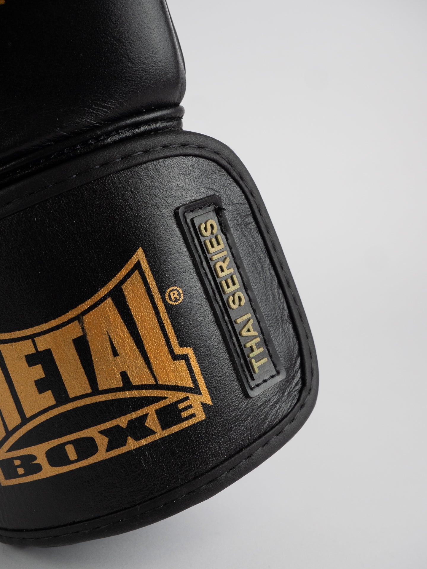 THAI SERIES BLACK GOLD LEATHER BOXING GLOVES