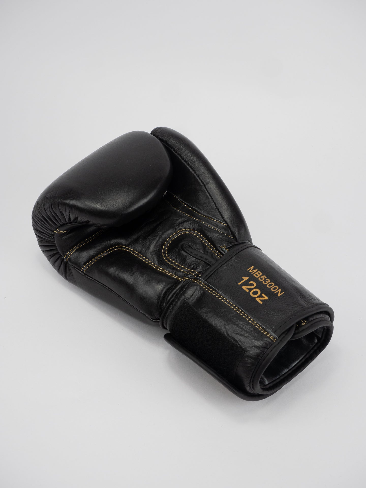 THAI SERIES BLACK GOLD LEATHER BOXING GLOVES
