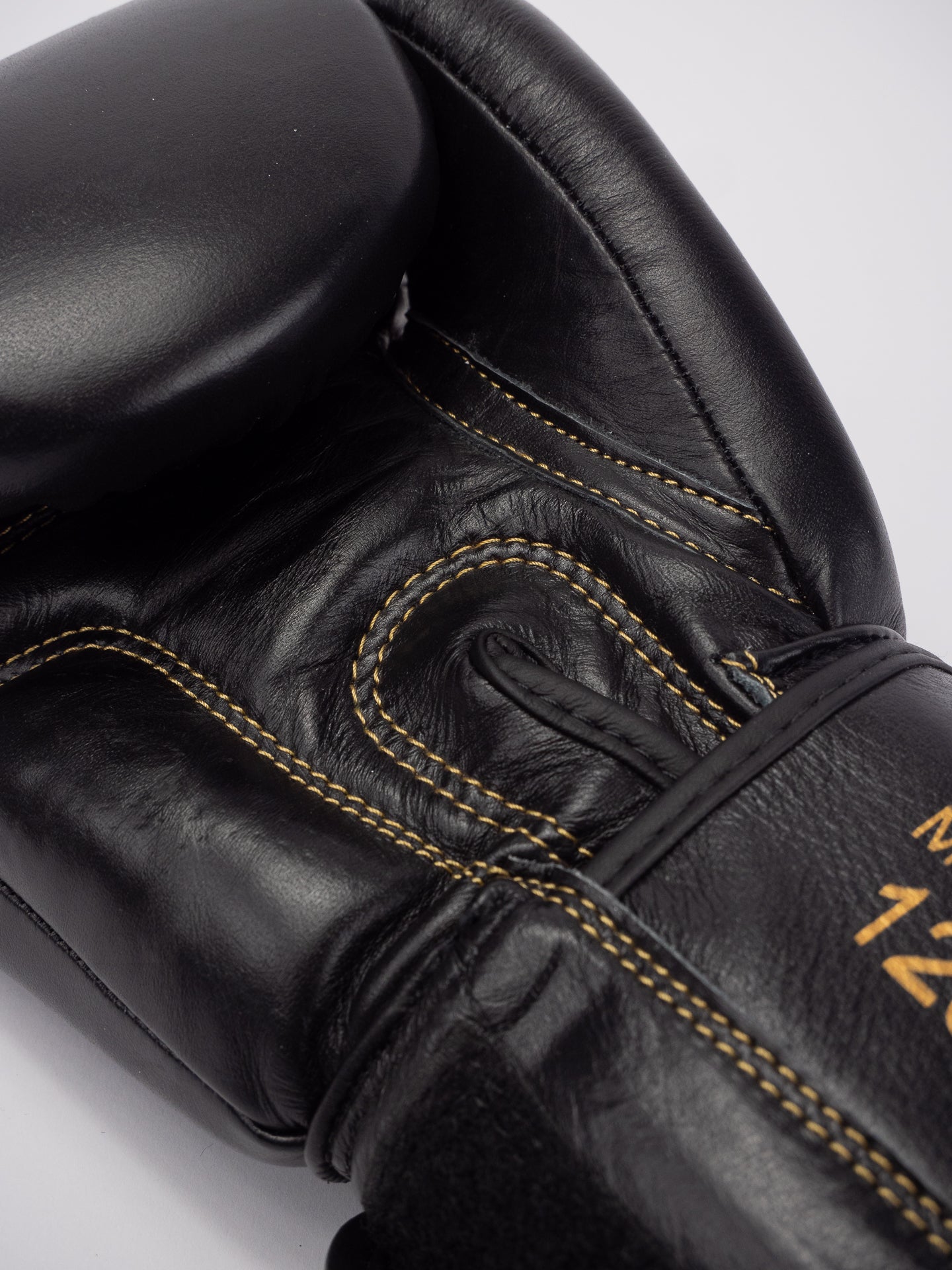 THAI SERIES BLACK GOLD LEATHER BOXING GLOVES