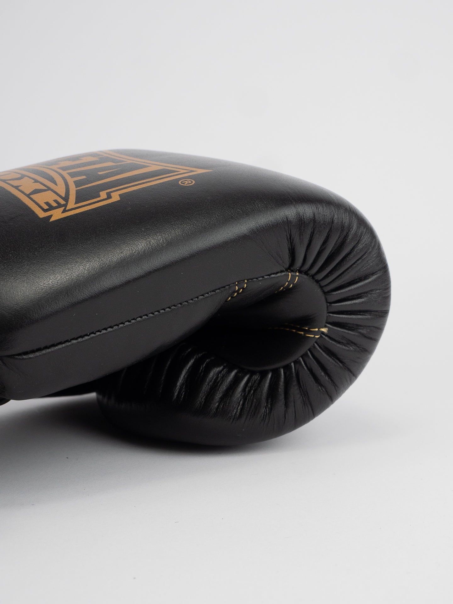 THAI SERIES BLACK GOLD LEATHER BOXING GLOVES