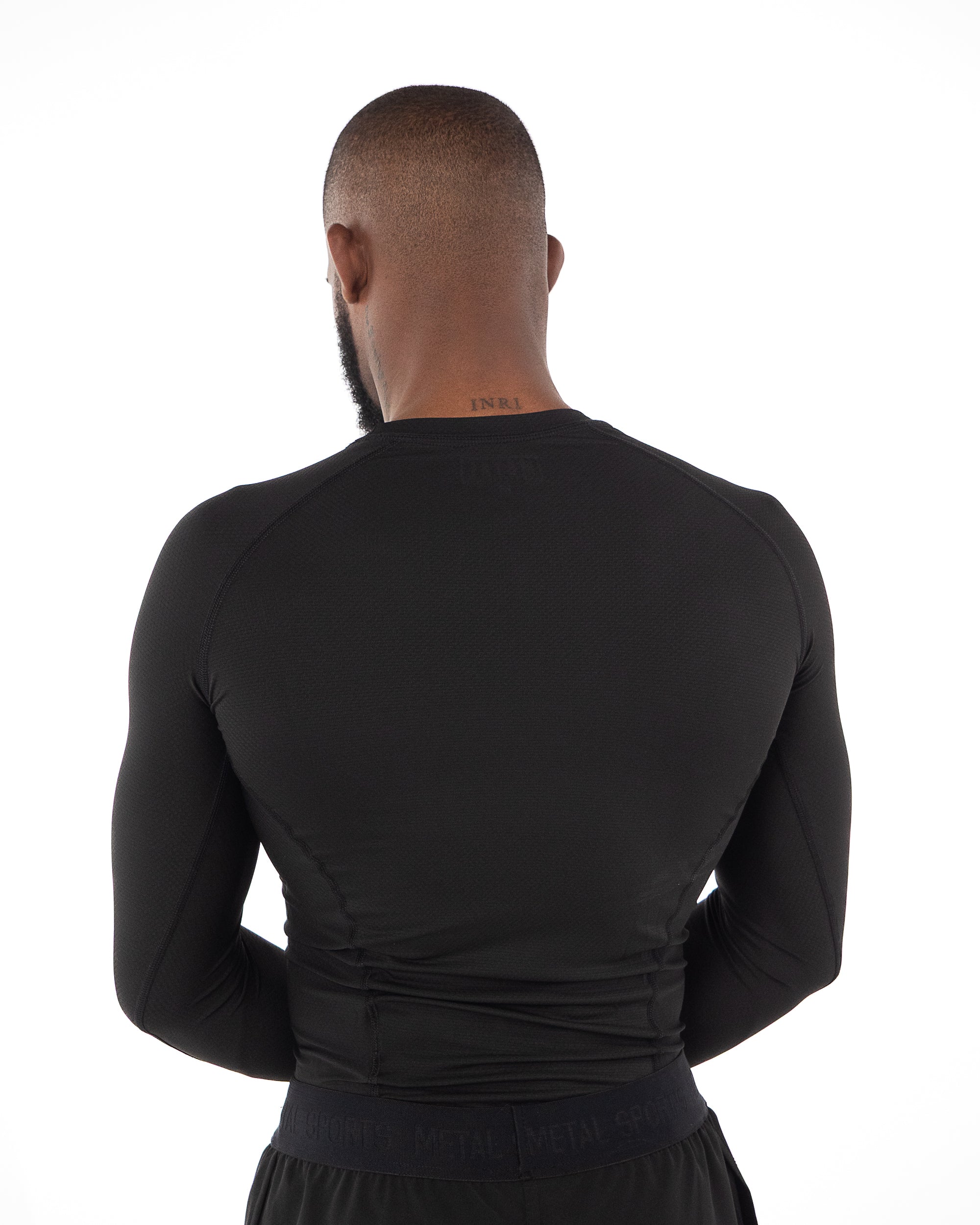 RASHGUARD PERFORMANCE MANCHES LONGUES NOIR