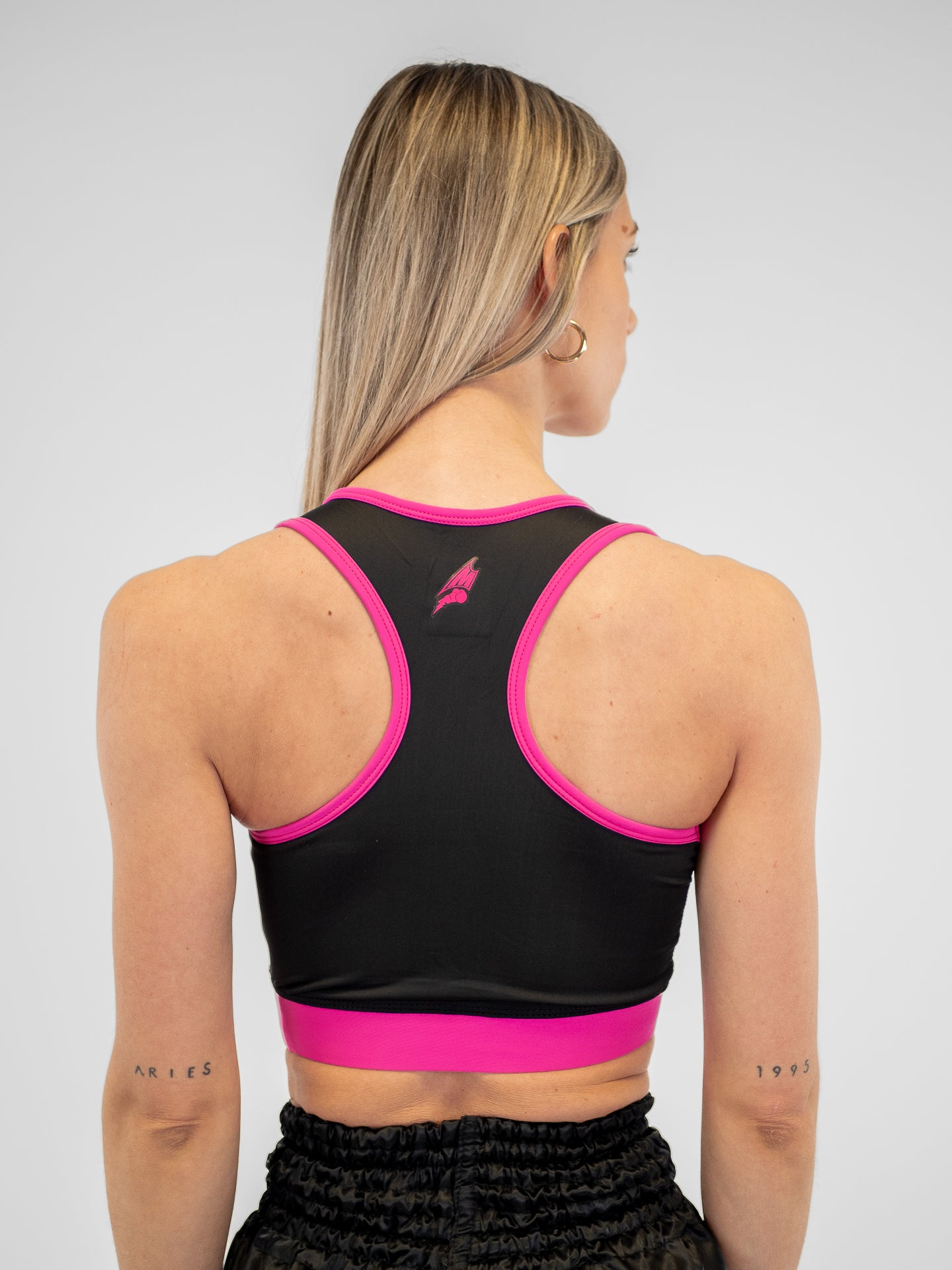 BRASSIERE SPORT NOIR FUCHSIA